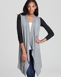 Draping elegantly on the frame, this Joie sweater boasts ribbed contrast sleeves for a striking juxtaposition. Draping elegantly on the frame, this Joie sweater boasts ribbed contrast sleeves for a striking juxtaposition.