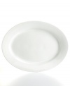 Keep it simple. In glossy white porcelain, this oval platter is a flawless accompaniment to any dinnerware pattern and decor. From Martha Stewart Collection.