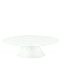 An elegant white-on-white pattern, embossed vine motif and interior glaze adorn this large cake stand from Lenox dinnerware. The dishes from the Opal Innocence Carved collection get the dessert table set for refined dining every day. An elegant white-on-white pattern, embossed vine motif and interior glaze adorn this large cake stand from Lenox dinnerware. The dishes from the Opal Innocence Carved collection get the dessert table set for refined dining every day.