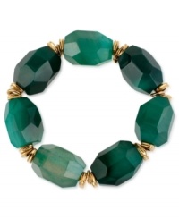 Look gorgeous in green. Robert Lee Morris' stretch bracelet is crafted from gold-tone mixed metal with semi-precious faceted green stones providing a fashion infusion. Approximate length: 7-1/2 inches. Look gorgeous in green. Robert Lee Morris' stretch bracelet is crafted from gold-tone mixed metal with semi-precious faceted green stones providing a fashion infusion. Approximate length: 7-1/2 inches.