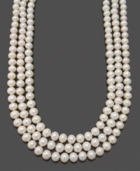 Triple the luxury with three luminous strands of cultured freshwater pearls (9-10 mm) set in 14k gold. Approximate necklace length: 17 inches.