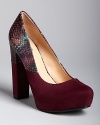 These boho, '70s-style Belle by Sigerson Morrison platform pumps will shake up your wardrobe, in soft suede combined with snake-embossed leather.