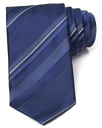 A luxurious finish to your professional look in supremely soft silk, featuring varying width tonal stripes for classic appeal. A luxurious finish to your professional look in supremely soft silk, featuring varying width tonal stripes for classic appeal.