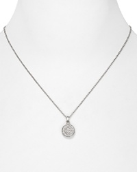 A long, slim chain necklace from Michael Kors. The curvy, concave pendant is decked in glittering pavé crystals for a subtle hint of sparkle. A long, slim chain necklace from Michael Kors. The curvy, concave pendant is decked in glittering pavé crystals for a subtle hint of sparkle.