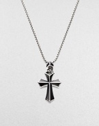 A rayskin-textured cross, crafted in sterling silver with contrasting onyx inlay. Sterling silver Onyx Pendant, about 2 long Necklace, about 20 long Imported 