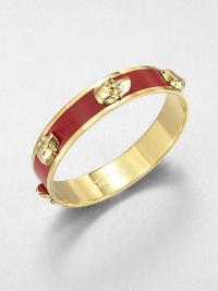 Shiny raised skulls on an enamel accented style. EnamelGoldtone brassDiameter, about 2.6Slip-on styleImported Shiny raised skulls on an enamel accented style. EnamelGoldtone brassDiameter, about 2.6Slip-on styleImported