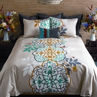 Double décor options, double happiness. The front of our Shangri-la duvet cover set shows a dramatic, oversized medallion motif printed in turquoise, yellow ochre and storm grey on a white and pebble background. Look closely for a bird, a bee, and flowers embroidered in coral. On the reverse, a pattern of white medallions stands like a screen set against storm grey Himalayan slopes. A real Kharma collection. Double décor options, double happiness. The front of our Shangri-la duvet cover set shows a dramatic, oversized medallion motif printed in turquoise, yellow ochre and storm grey on a white and pebble background. Look closely for a bird, a bee, and flowers embroidered in coral. On the reverse, a pattern of white medallions stands like a screen set against storm grey Himalayan slopes. A real Kharma collection.