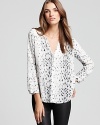 Embrace your natural animal magnetism in this leopard-printed Joie top made from pure silk.