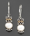 A glistening pearl (8.5mm) is elegantly situated between sterling silver beads and 14K gold accents in these wear-ready earrings.