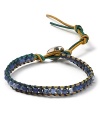 Chan Luu's must have wrap bracelets, crafted of leather cord and multi colored stones, perfect free spirited style. This sodalite-embellished piece is a bold way to work the look.