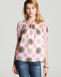 Tonal hues are highlighted by pops of pink on this effortless Milly top designed with buttons through one side for unique detail. Create a cool duet with distressed denim and give this uptown look downtown edge. Tonal hues are highlighted by pops of pink on this effortless Milly top designed with buttons through one side for unique detail. Create a cool duet with distressed denim and give this uptown look downtown edge.