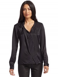 THE LOOKV necklineFold-over collar with knot detail at one shoulderRuffle cascades diagonally down the frontLong sleeves with button cuffsTHE FITAbout 24 from shoulder to hemTHE MATERIALSilkCARE & ORIGINDry cleanImported