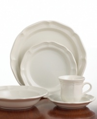 A gently scalloped edge in hardy stoneware gives the Mikasa French Country dinnerware set an effortless grace that's ideal for every day. Oversized plates, bowls and serving pieces are finished with a rich, creamy glaze to suit any setting. A gently scalloped edge in hardy stoneware gives the Mikasa French Country dinnerware set an effortless grace that's ideal for every day. Oversized plates, bowls and serving pieces are finished with a rich, creamy glaze to suit any setting.
