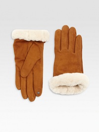 Genuine shearling cuffs perfectly complement these stylish suede gloves.Cashmere liningAbout 9 longImported Genuine shearling cuffs perfectly complement these stylish suede gloves.Cashmere liningAbout 9 longImported