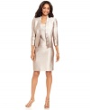 Kasper crafts the ultimate special occasion skirt suit--three pieces are rendered in a shimmery, textured fabric and the jacket is decked out with a pleated, ribbon-like trim at the neck and front placket.