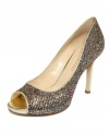 The Enzo Angiolini Maiven Pumps are an expertly designed essential with unique finishes, trim platform and slim heel.