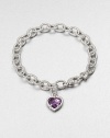 A sweet style with a textured sterling silver link chain and an amethyst heart charm. AmethystSterling silverLength, about 7.5Lobster clasp closureImported 