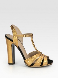 Metallic leather sandal with a hidden platform and goldtone metal studs. Self-covered heel, 4¾ (120mm)Hidden platform, ¾ (20mm)Compares to a 4 heel (100mm)Metallic leather upper with metal studsLeather lining and solePadded insoleMade in Italy Metallic leather sandal with a hidden platform and goldtone metal studs. Self-covered heel, 4¾ (120mm)Hidden platform, ¾ (20mm)Compares to a 4 heel (100mm)Metallic leather upper with metal studsLeather lining and solePadded insoleMade in Italy
