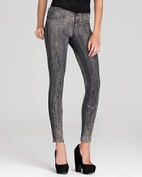 A stylish alternative to your everyday blues, these distressed skinny jeans offer a cool, cracked paint print for an edgier downtown vibe. A stylish alternative to your everyday blues, these distressed skinny jeans offer a cool, cracked paint print for an edgier downtown vibe.