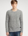 A luxe blend of merino wool and cashmere all in a classic crewneck pullover.CrewneckInverted seams at shouldersRibbed trimPullover style68% merino wool/29% cashmere/3% polyamideDry cleanImported