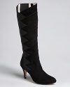 Designer Taryn Rose weaves together pure style and comfort in a remarkable pair of boots that easily dress up or down.