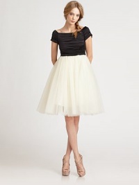 Party-ready in this charming off-the-shoulder frock styled with a fitted ruched bodice and voluminous tulle skirt.BoatneckCap sleevesSet-in waistBelt is removableGathered skirtCenter back zipperAbout 25 from shoulder to hemNylonDry cleanImported of USA fabricModel shown is 5'9 (175cm) wearing US size 4. Party-ready in this charming off-the-shoulder frock styled with a fitted ruched bodice and voluminous tulle skirt.BoatneckCap sleevesSet-in waistBelt is removableGathered skirtCenter back zipperAbout 25 from shoulder to hemNylonDry cleanImported of USA fabricModel shown is 5'9 (175cm) wearing US size 4.
