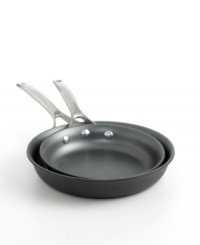 Experience the ease of a professional! Own the kitchen with two dynamic omelette pans, featuring revolutionary nonstick interiors for incredibly effortless food release and smart cooking that involves less oil and grease. Clean up fast with a dishwasher-safe design that makes these pans your go-to on the range. Lifetime warranty. Experience the ease of a professional! Own the kitchen with two dynamic omelette pans, featuring revolutionary nonstick interiors for incredibly effortless food release and smart cooking that involves less oil and grease. Clean up fast with a dishwasher-safe design that makes these pans your go-to on the range. Lifetime warranty.