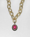 From the Laguna Collection. A pretty, faceted fuchsia quartz center set in 18k gold and sterling silver accented with three rows of rich black spinel. Fuchsia quartz18k goldSterling silverBlack spinelSize, about 1.33Black spinel accented baleImported Please note: Chain sold separately. 