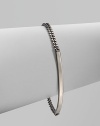 A chic, curved bar on a narrow link chain accented with a logo charm for a sleek design. Ruthenium-plated brassLength, about 7Lobster clasp closureMade in Italy