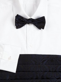 An elegant coordinating set for every formal affair, crafted in rich silk brocade.Includes pre-tied bowtie and stitched cummerbundDry cleanMade in USA An elegant coordinating set for every formal affair, crafted in rich silk brocade.Includes pre-tied bowtie and stitched cummerbundDry cleanMade in USA