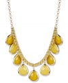 Soak up some sunny color. Haskell's frontal necklace brings focus to chartreuse acrylic beads in a teardrop design. A tonal cord intertwines with the box chain. Crafted in gold tone mixed metal. Approximate length: 17 inches + 3-inch extender. Approximate drop: 1-1/2 inches.