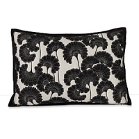 A stark black and white print, stitched around each flower, reverses to a fine stripe. A stark black and white print, stitched around each flower, reverses to a fine stripe.
