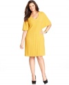 Look chic in cooler temps with Style&co.'s butterfly sleeve plus size sweater dress, crafted from a cable knit.