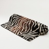 The call of the wild! Luxe bath rug made from a plush cotton. Fashioned in an exotic zebra print to liven up the bath area.
