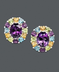 Add a playful touch to your look with fresh color. These vivid stud earrings feature clusters of gemstones including an oval-cut amethyst center (6 ct. t.w.) surrounded by blue topaz (1-1/5 ct. t.w.), citrine (7/8 ct. t.w.), and peridot (1-1/10 ct. t.w.). Crafted in sterling silver. Approximate diameter: 3/4 inch.