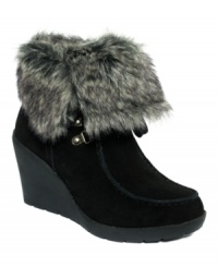 Stay warm in the lowest temperatures. Khombu's Slide cold weather booties are made of waterproof suede and feature a fold-down plush faux-fur-lined collar. Stay warm in the lowest temperatures. Khombu's Slide cold weather booties are made of waterproof suede and feature a fold-down plush faux-fur-lined collar.