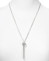 A chain tassel give this pendant necklace from Links of London a cool edge. In striking sterling silver, this piece pops against a simple sweater or dress.