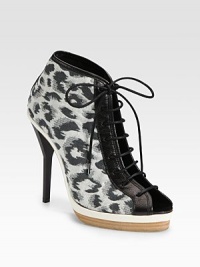 Stretchy, leopard-print canvas with leather trim and a convenient lace-up front. Self-covered heel, 5 (125mm)Covered platform, 1 (25mm)Compares to a 4 heel (100mm)Canvas and leather upperLeather liningBuffed leather solePadded insoleMade in ItalyOUR FIT MODEL RECOMMENDS ordering one half size up as this style runs small. Stretchy, leopard-print canvas with leather trim and a convenient lace-up front. Self-covered heel, 5 (125mm)Covered platform, 1 (25mm)Compares to a 4 heel (100mm)Canvas and leather upperLeather liningBuffed leather solePadded insoleMade in ItalyOUR FIT MODEL RECOMMENDS ordering one half size up as this style runs small.