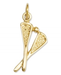 A total catch! This sporty charm includes two traditional lacrosse sticks and a lacrosse ball in polished 14k gold. Chain not included. Approximate length: 1 inch. Approximate width: 2/5 inch.