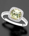 A gorgeous mix of color and sparkle. This ring features cushion-cut green quartz (1-1/10 ct. t.w.) surrounded by glittering round-cut diamonds (1/5 ct. t.w.). Set in 14k white gold.