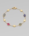 Beautiful hand-engraved 18k gold and colorful, faceted sapphires on a delicate link chain. 18k goldMulti-colored sapphiresLength, about 7¾Lobster clasp closureMade in Italy