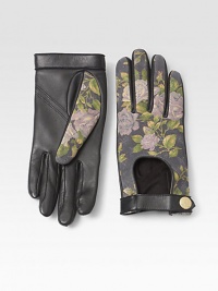 A beautiful floral design completes this biker meets babe design of ultra-soft lambskin leather.Snap-button closureLength, about 8.5LeatherDry cleanImported A beautiful floral design completes this biker meets babe design of ultra-soft lambskin leather.Snap-button closureLength, about 8.5LeatherDry cleanImported