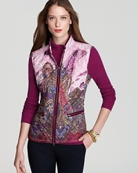 With a rich palette and intricate paisley print, this BASLER vest evokes a gorgeous elegance. Slip it on and take your everyday look to new heights of chic. With a rich palette and intricate paisley print, this BASLER vest evokes a gorgeous elegance. Slip it on and take your everyday look to new heights of chic.