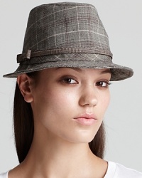 This preppy chic fedora is mad for plaid without taking it over the top; by August Accessories. This preppy chic fedora is mad for plaid without taking it over the top; by August Accessories.