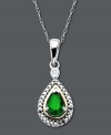 The perfect way to celebrate a May birthday - this pretty teardrop pendant exudes a subtle, green sheen. Crafted in 14k gold and sterling silver, a pear-cut emerald (3/8 ct. t.w.) and round-cut diamond accent add just the right shine. Approximate length: 18 inches. Approximate drop: 1 inch.