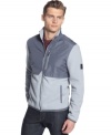 Race with the wind with this fashion forward tonal moto styled fleece jacket by Calvin Klein.