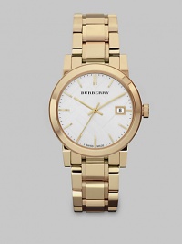 An iconic check stamped dial with a radiant goldtone stainless steel link bracelet. Swiss quartz movementWater resistant to 5 ATMRound goldtone stainless steel case, 34mm (1.3)Smooth bezelSilver check stamped dialBar hour markersDate display at 3 o'clockSecond hand Goldtone stainless steel link braceletMade in Switzerland An iconic check stamped dial with a radiant goldtone stainless steel link bracelet. Swiss quartz movementWater resistant to 5 ATMRound goldtone stainless steel case, 34mm (1.3)Smooth bezelSilver check stamped dialBar hour markersDate display at 3 o'clockSecond hand Goldtone stainless steel link braceletMade in Switzerland