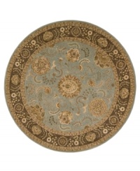 A muted blue field is accented with rich tones of beige and brown on this beautiful rug from Nourison. Incredibly soft New Zealand wool is tufted by hand and highlighted with pure silk for a truly majestic look and feel. A muted blue field is accented with rich tones of beige and brown on this beautiful rug from Nourison. Incredibly soft New Zealand wool is tufted by hand and highlighted with pure silk for a truly majestic look and feel.