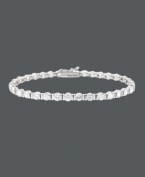 For a look that's red-carpet worthy...strike a pose in B. Brilliant! This eye-catching tennis bracelet features dozens of sparkling, channel-set cubic zirconias (10 ct. t.w.). Crafted in sterling silver. Approximate length: 7-1/4 inches.