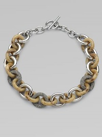 This mixed-media design features horn print acetate, sleek silvertone and rhinestone encrusted, graduated links. Steel and brassAcetateGlass stonesLength, about 17Toggle closureImported This mixed-media design features horn print acetate, sleek silvertone and rhinestone encrusted, graduated links. Steel and brassAcetateGlass stonesLength, about 17Toggle closureImported